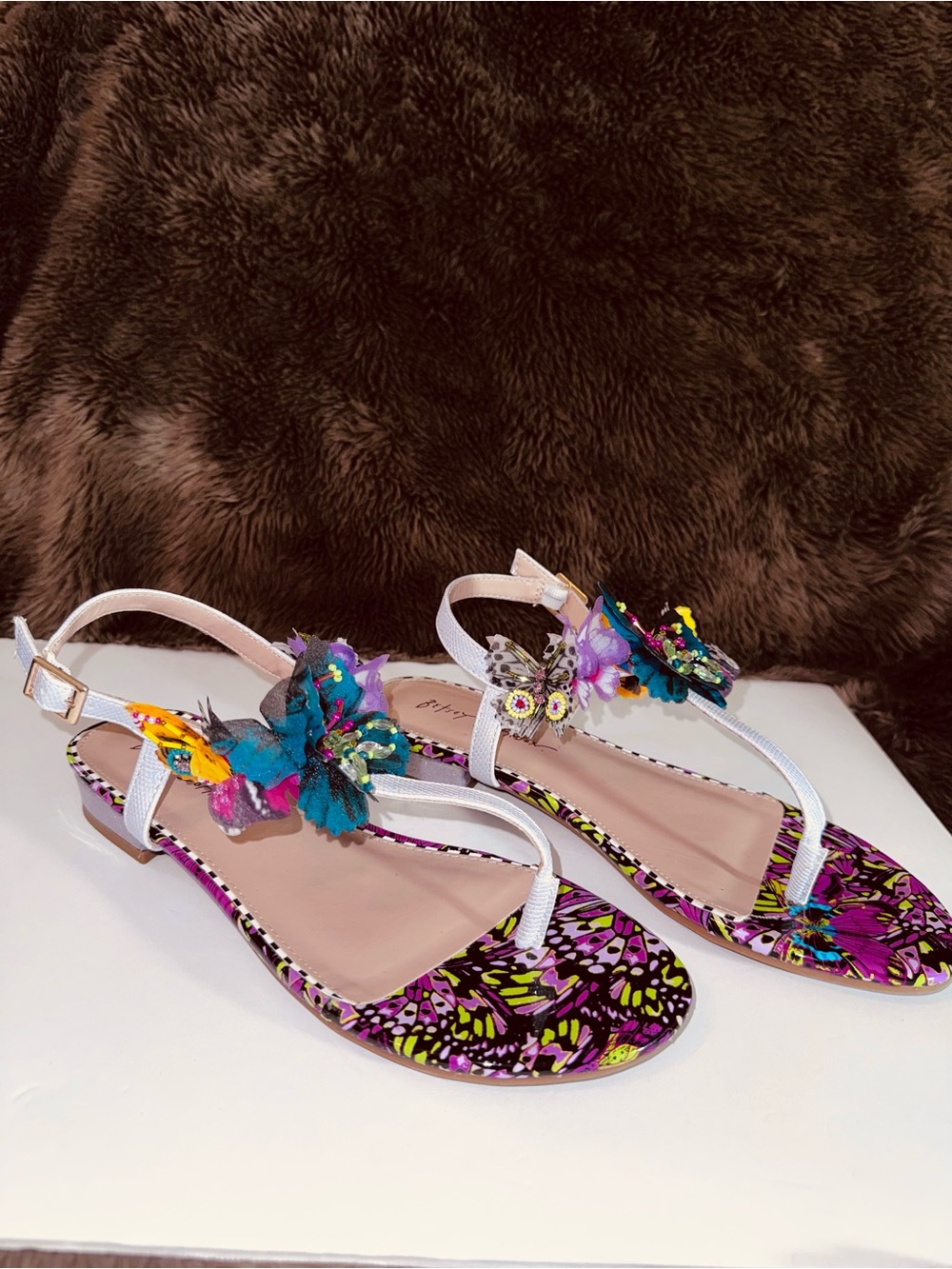 Betsey Johnson White-Strap Sandals with Multicolor Floral & Butterfly Accents
